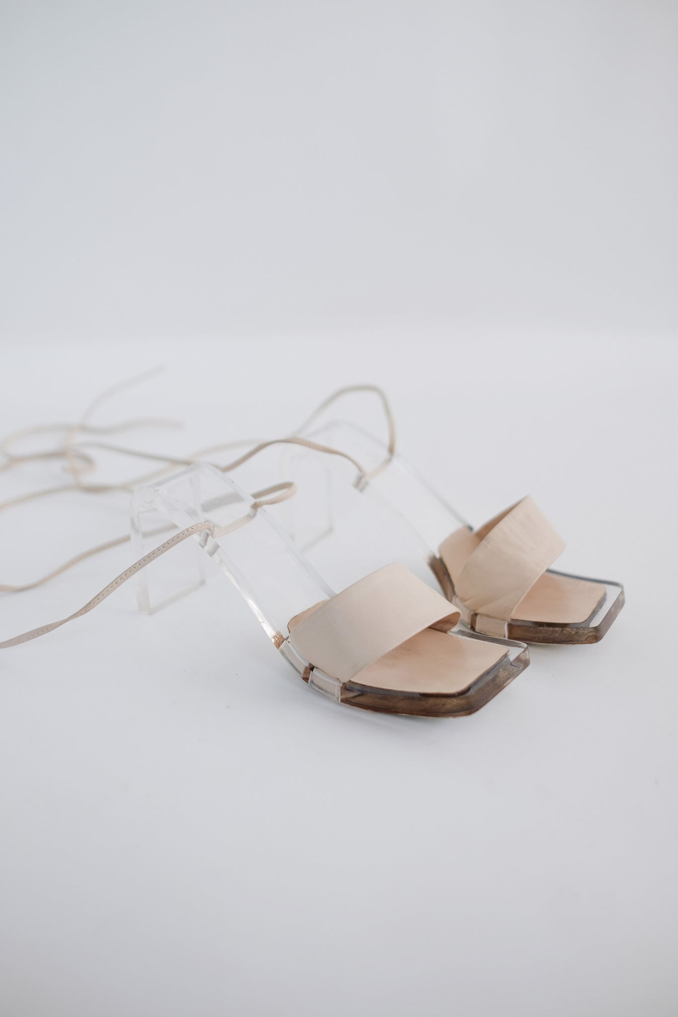 LES COPAINS CRYSTAL SANDALS IN PLEXI & PANNA LEATHER