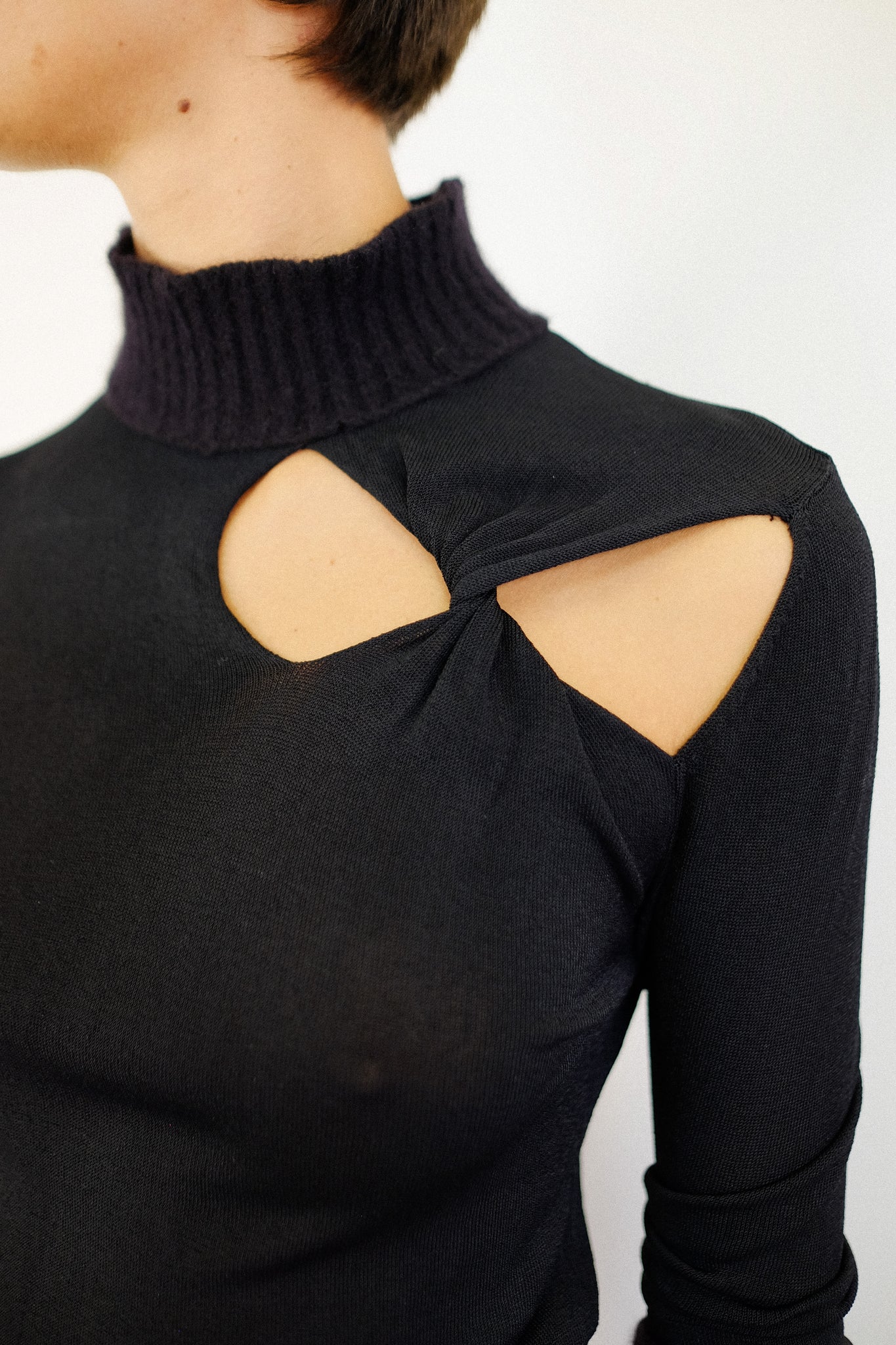 GAZEBO MESH AND KNIT TWIST SWEATER IN BLACK