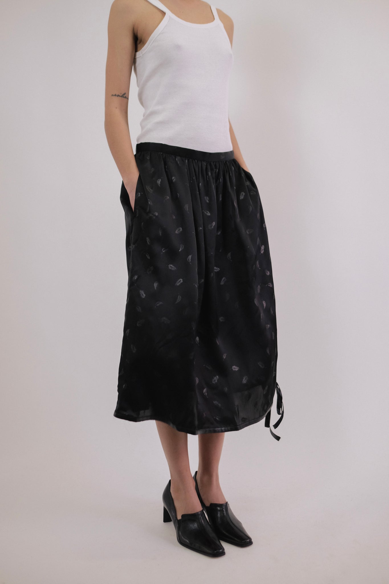 NOIR KEI NINOMIYA FOR COMME DES GARCONS SKIRT IN BLACK JACQUARD