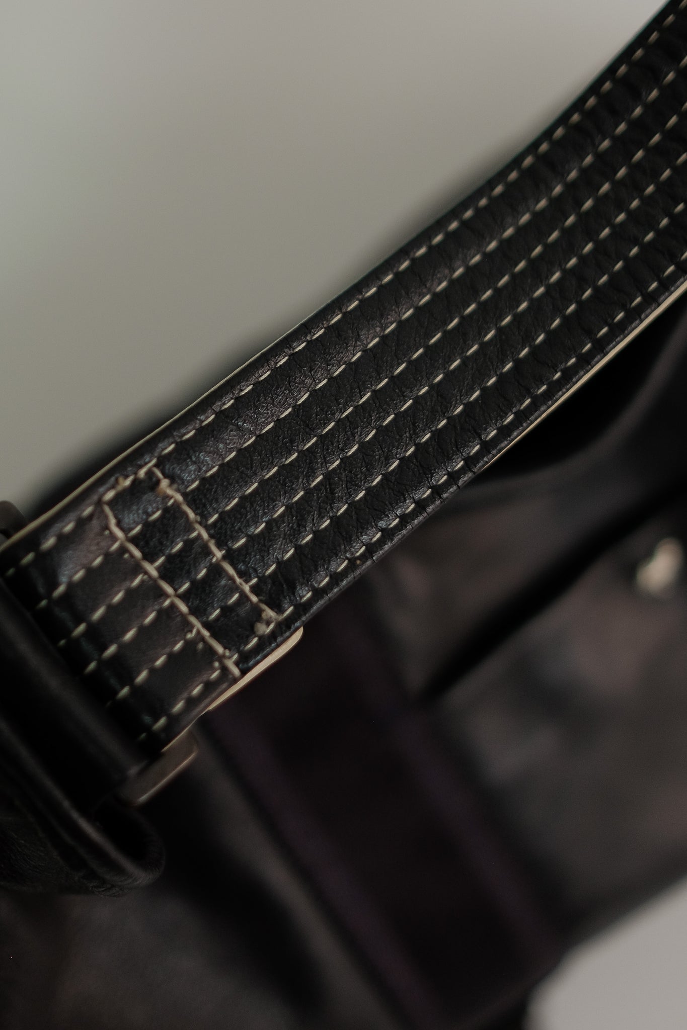 MANDARINA DUCK LEATHER CAGE BAG IN BLACK