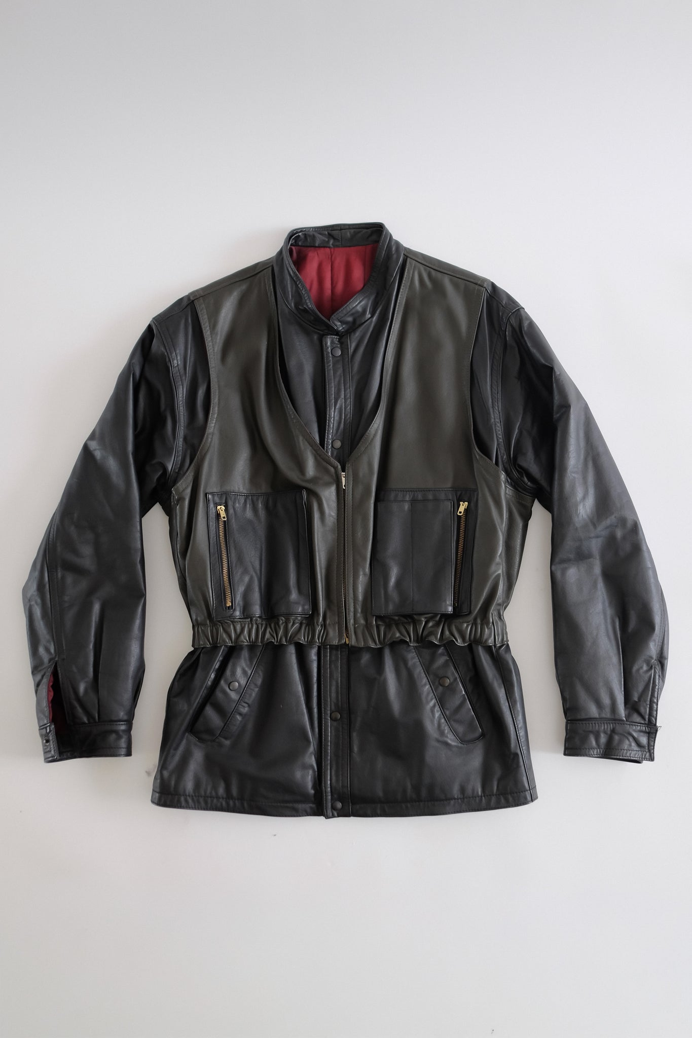 LEATHER DOUBLE VEST JACKET IN BLACK AND DARK OLIVE