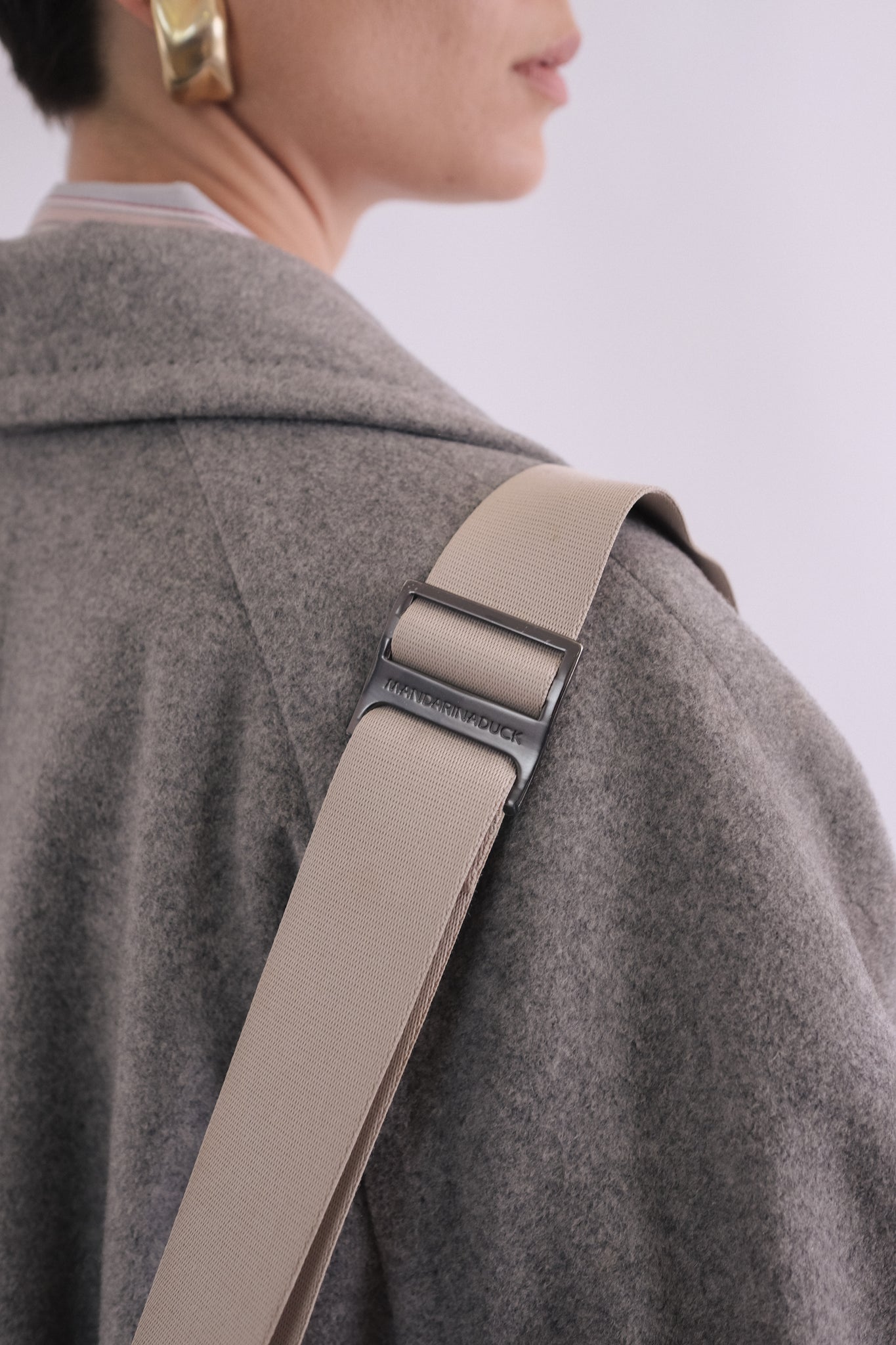 MANDARINA DUCK LEATHER POUCH BAG IN TAUPE WHITE