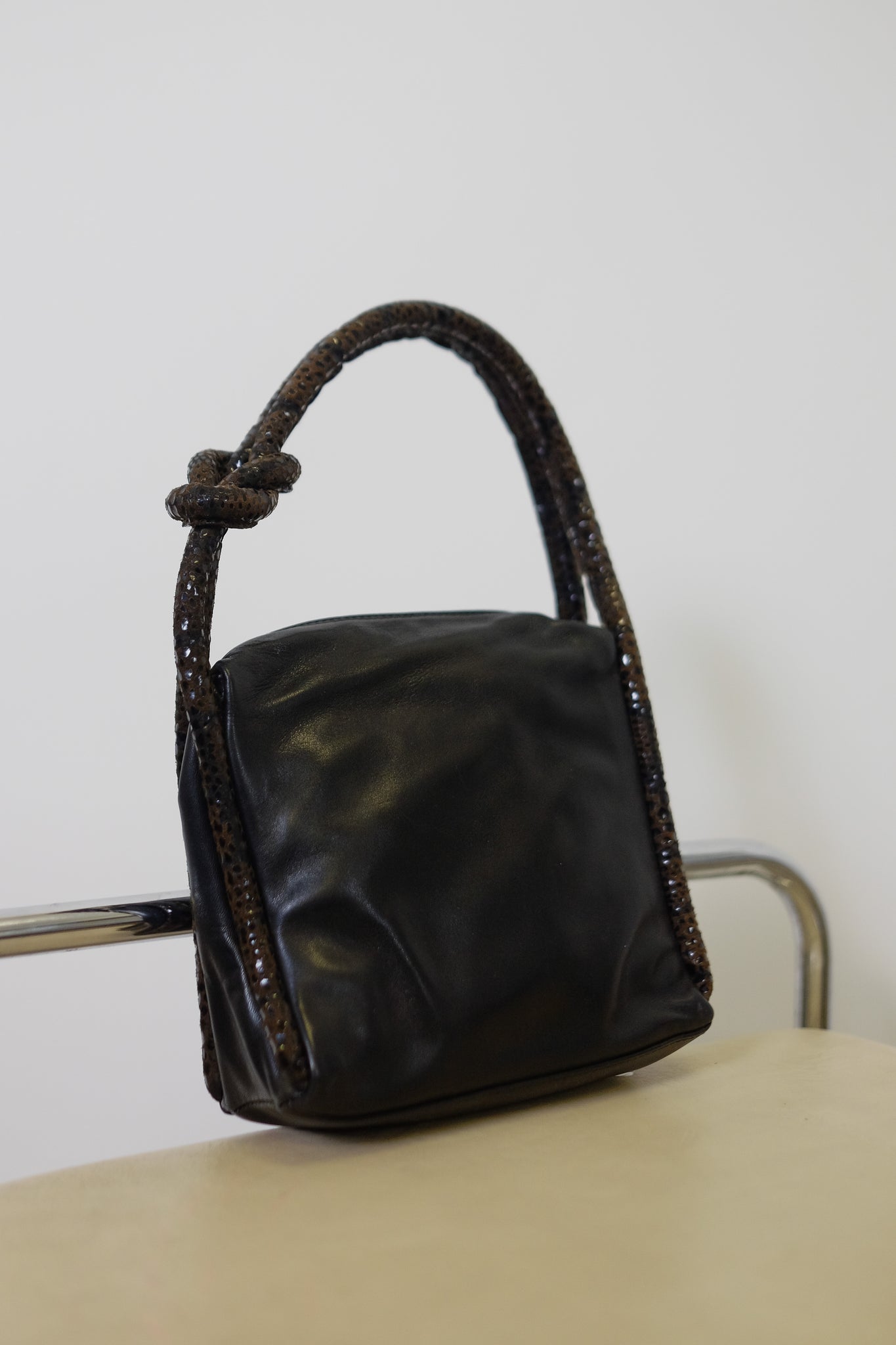 SERGIO CIARNELLI DEADSTOCK KNOT EVENING BAG IN BLACK CALF