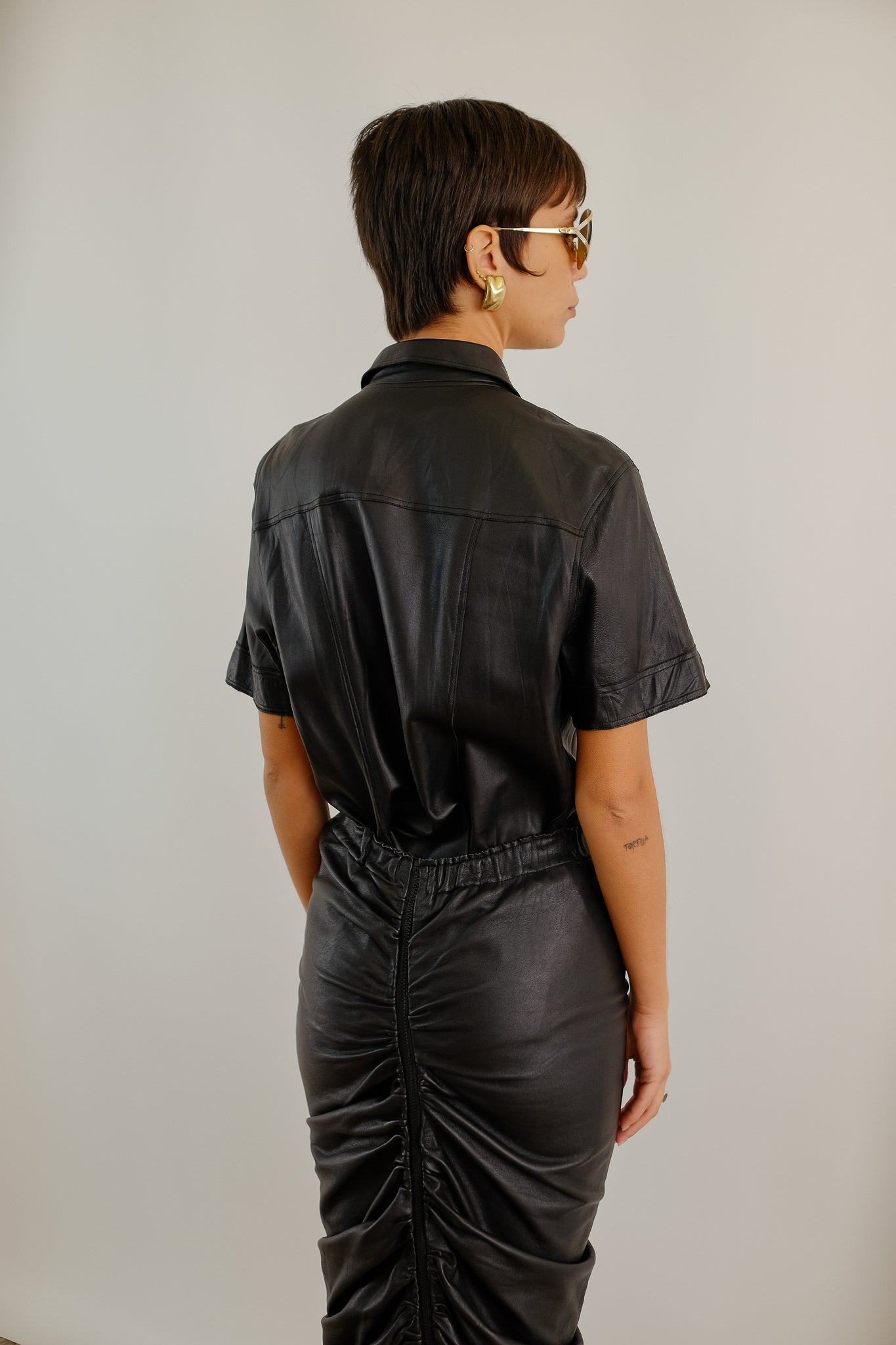 LEATHER RUCHED SKIRT IN BLACK