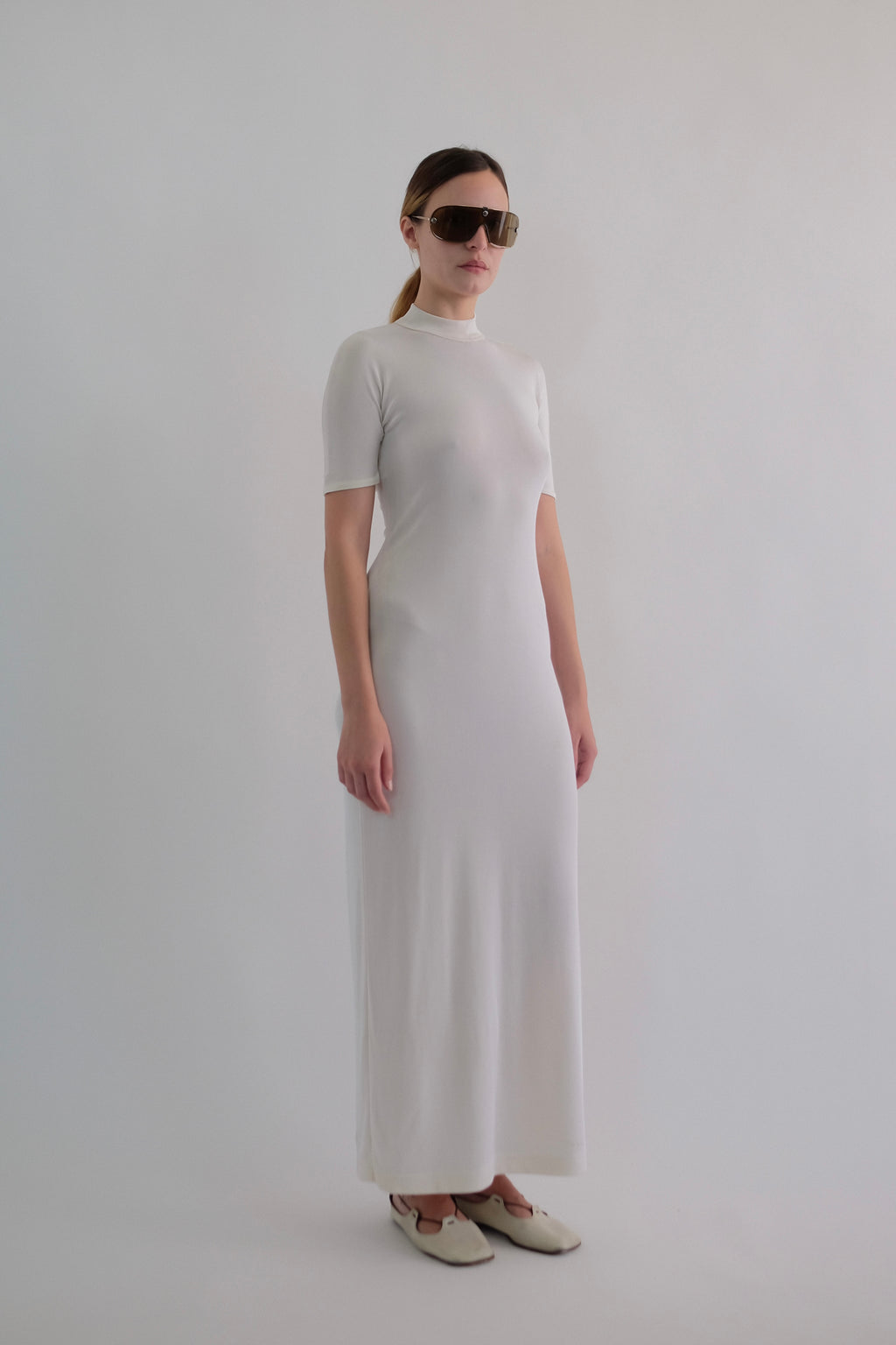 I GABBIANI BACKLESS MAXI T DRESS IN WHITE