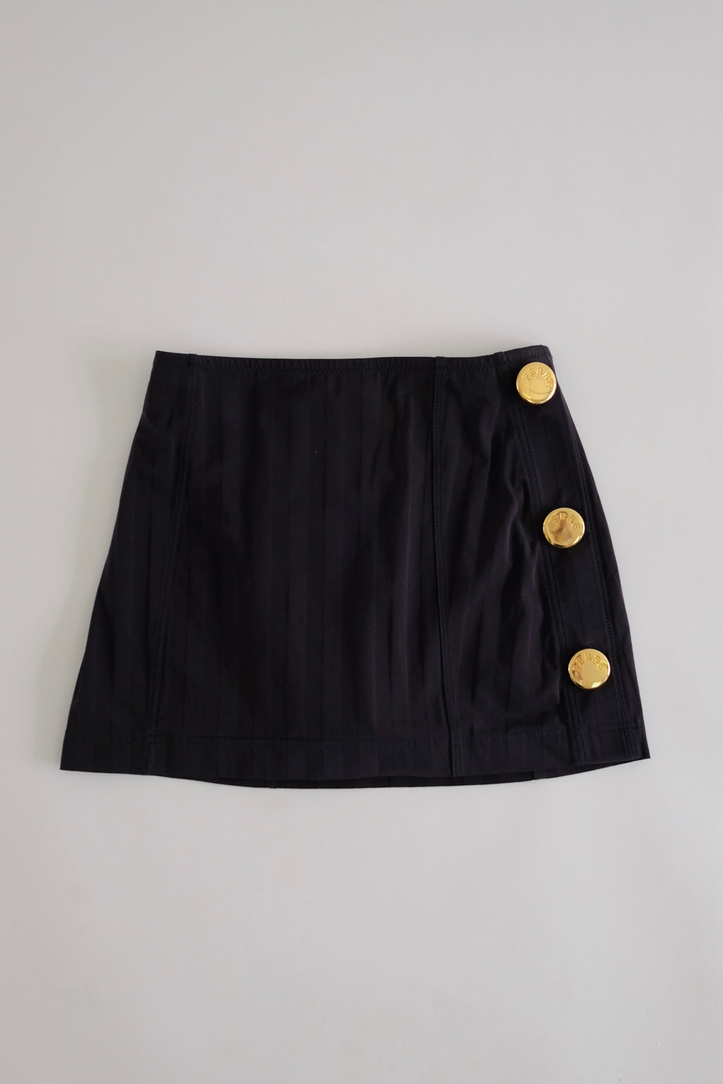 1980S GIANFRANCO FERRÉ MINI BUTTON SWIM SKIRT IN BLACK