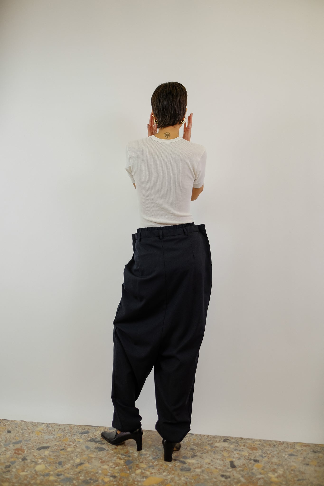 TAILORED HIGH PLEAT TROUSERS IN BLACK
