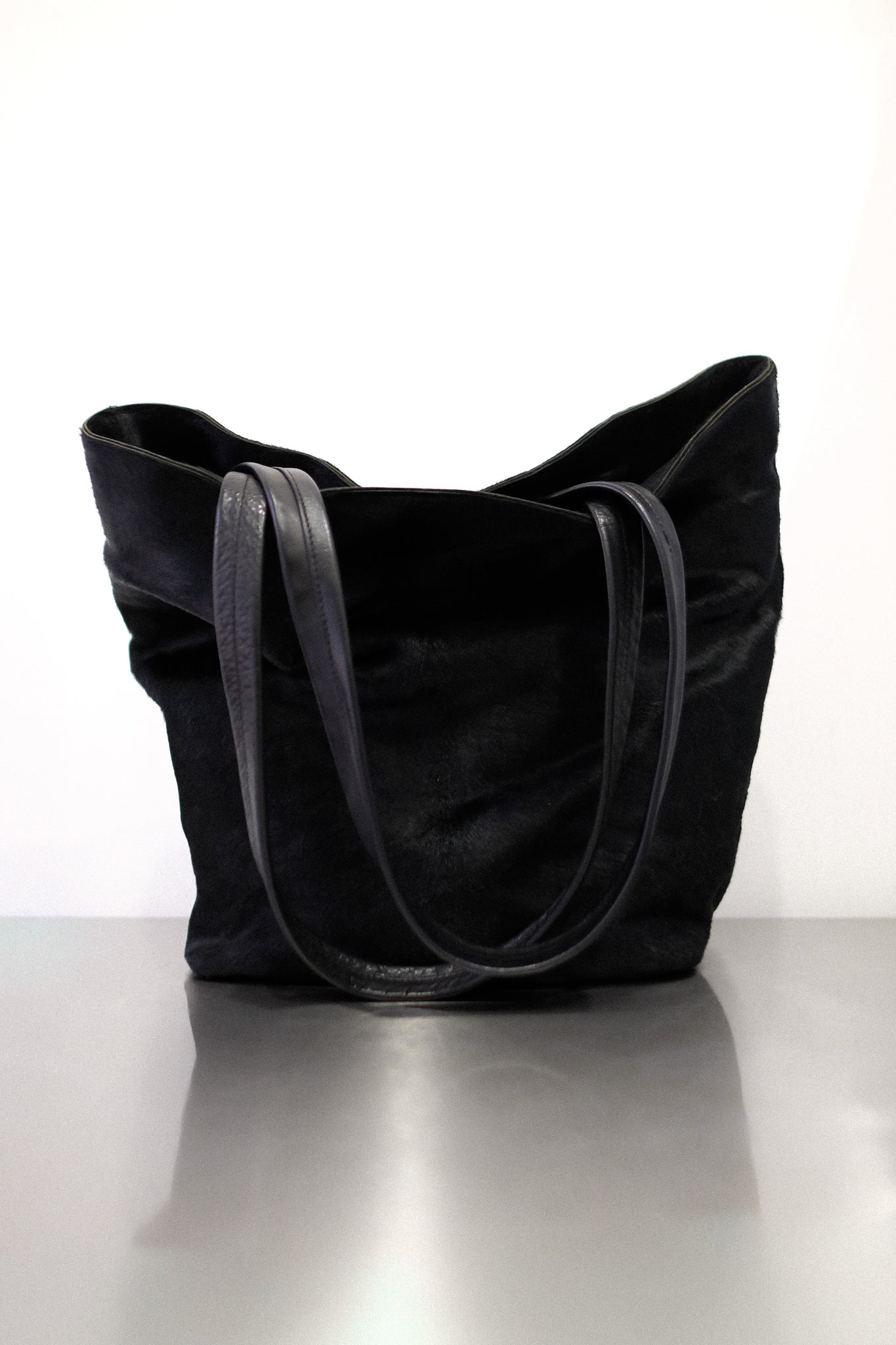 PONY HAIR BUCKET BAG IN BLACK