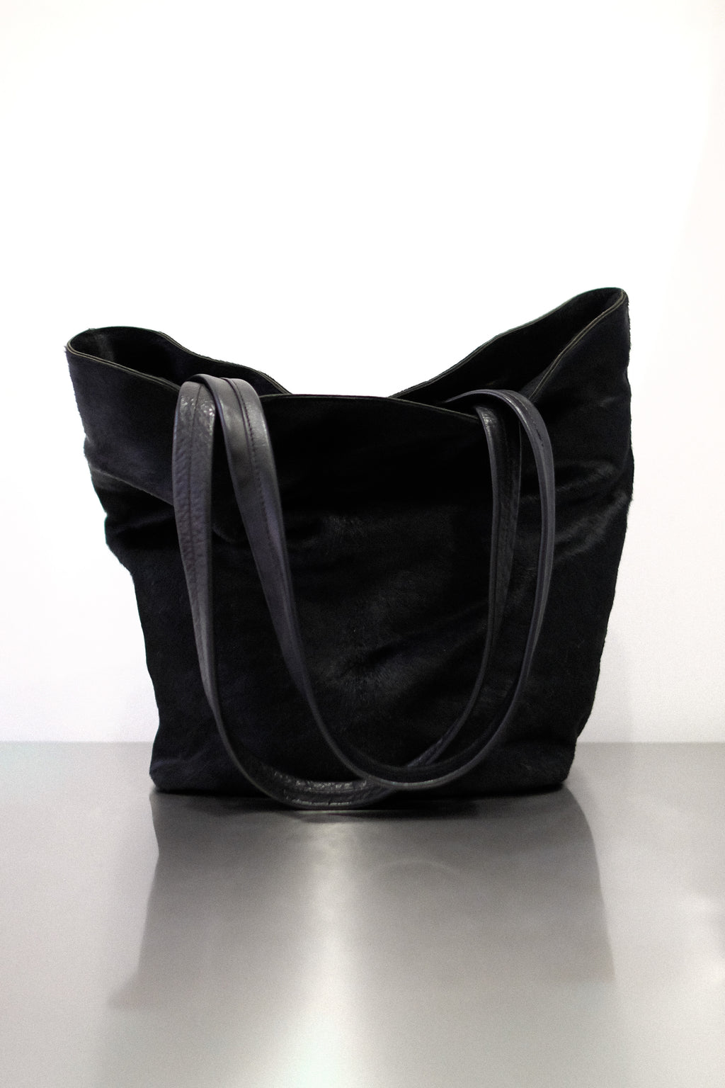 PONY HAIR BUCKET BAG IN BLACK