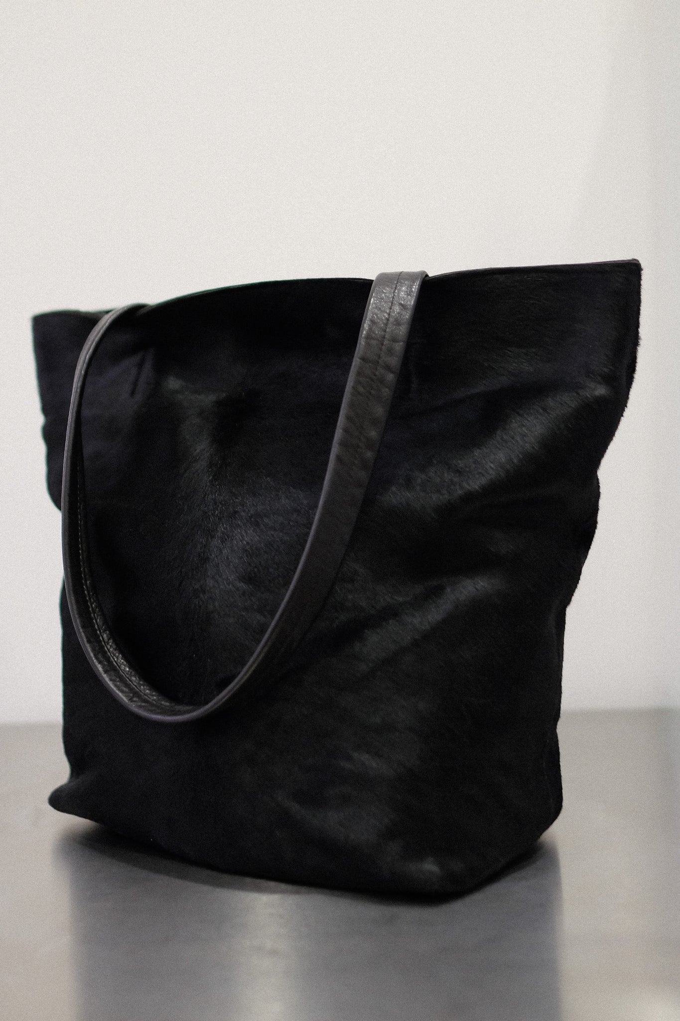 PONY HAIR BUCKET BAG IN BLACK