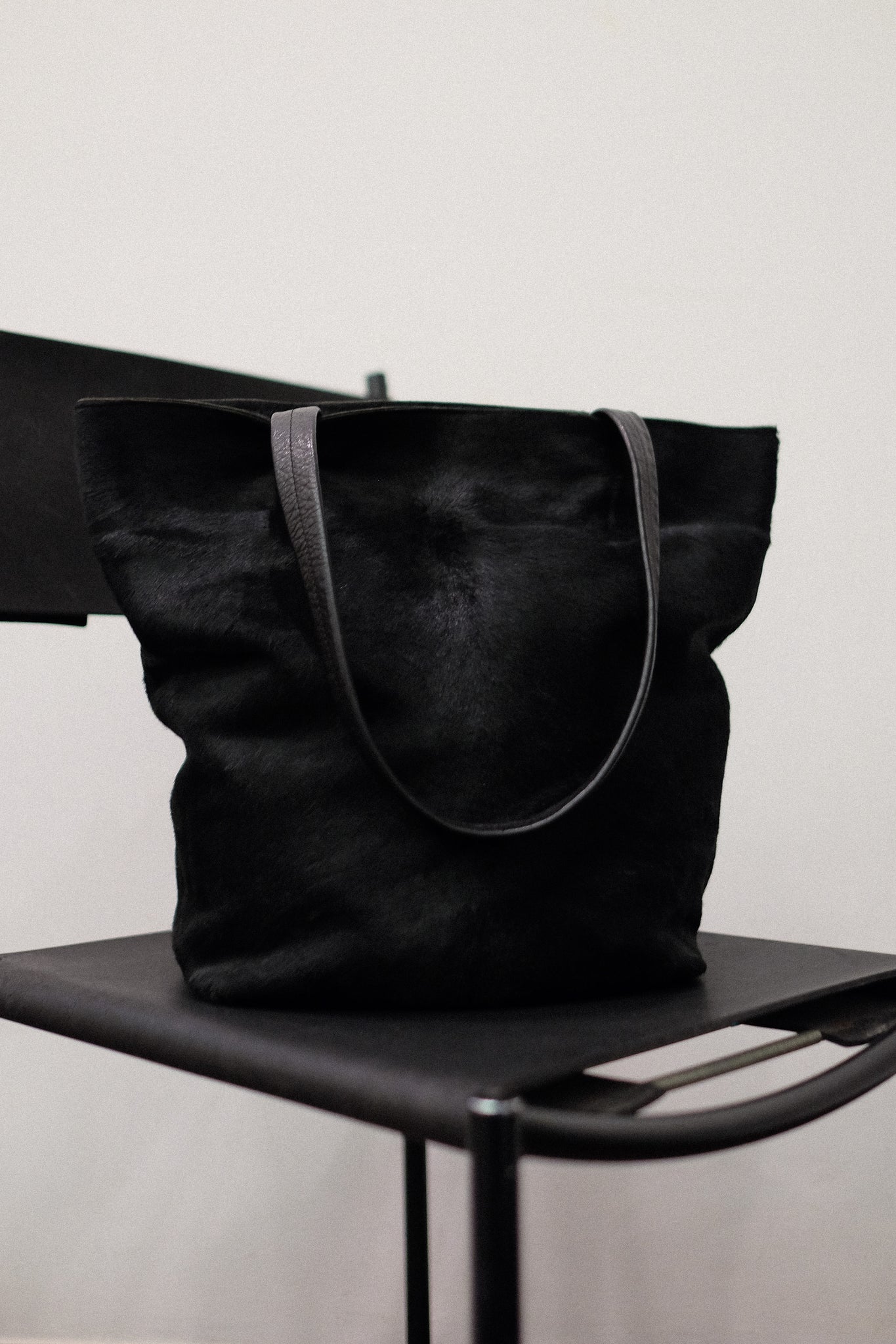 PONY HAIR BUCKET BAG IN BLACK