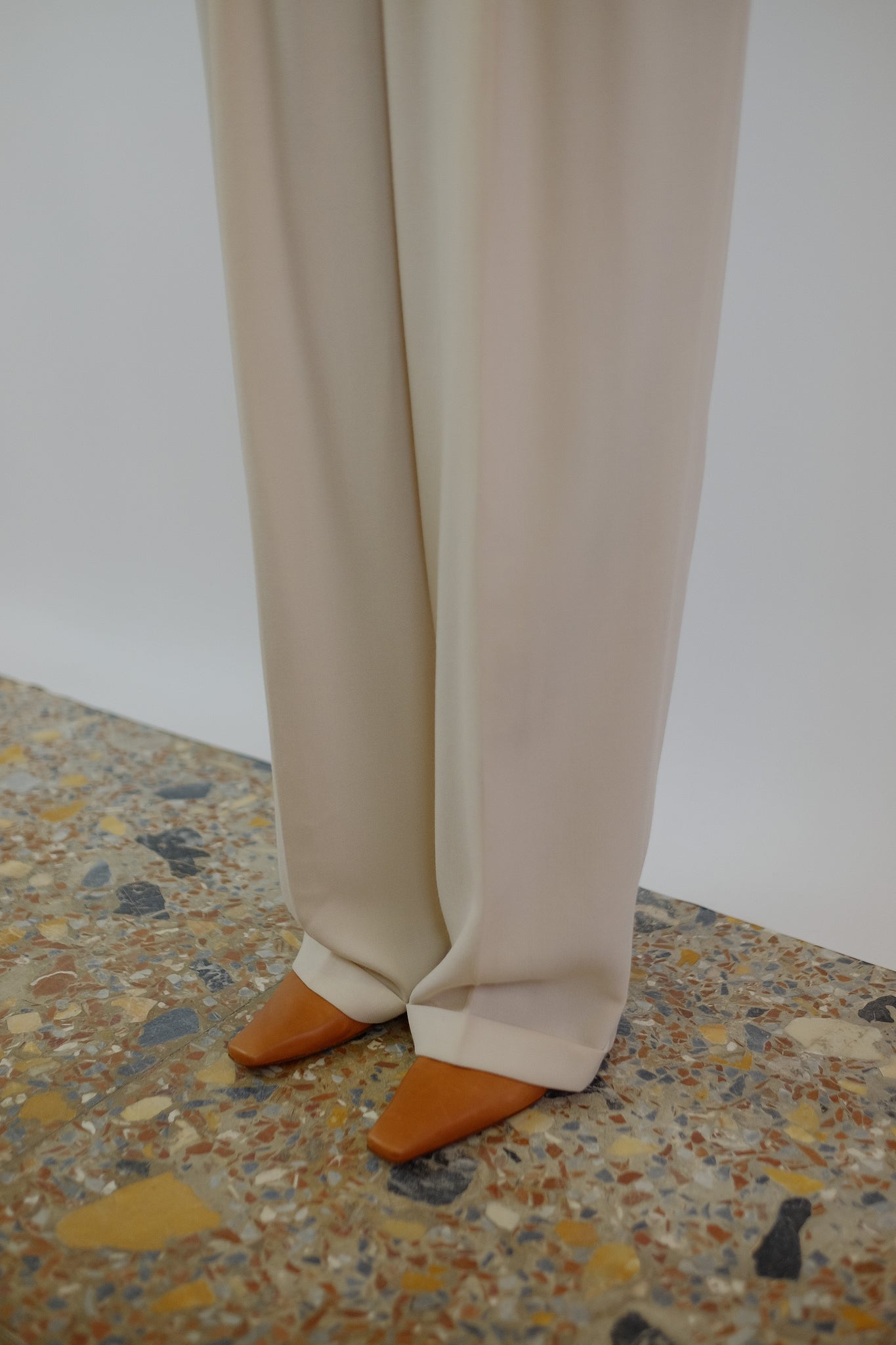 EARLY EMPORIO ARMANI PLEAT PANTS IN PASTEL CREAM