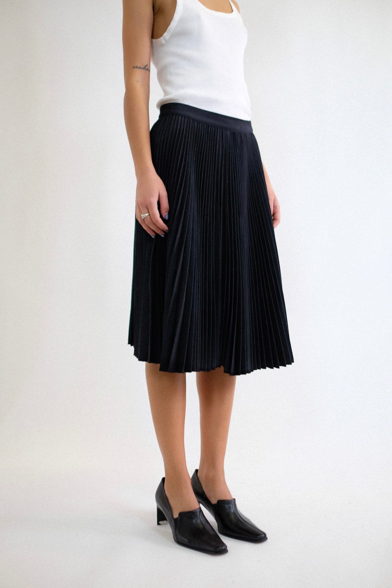 KATHARINE HAMNETT LONDON PLEATED WOOL SKIRT IN BLACK