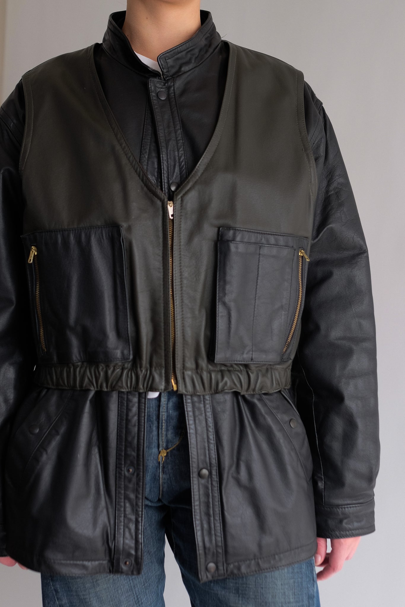 LEATHER DOUBLE VEST JACKET IN BLACK AND DARK OLIVE