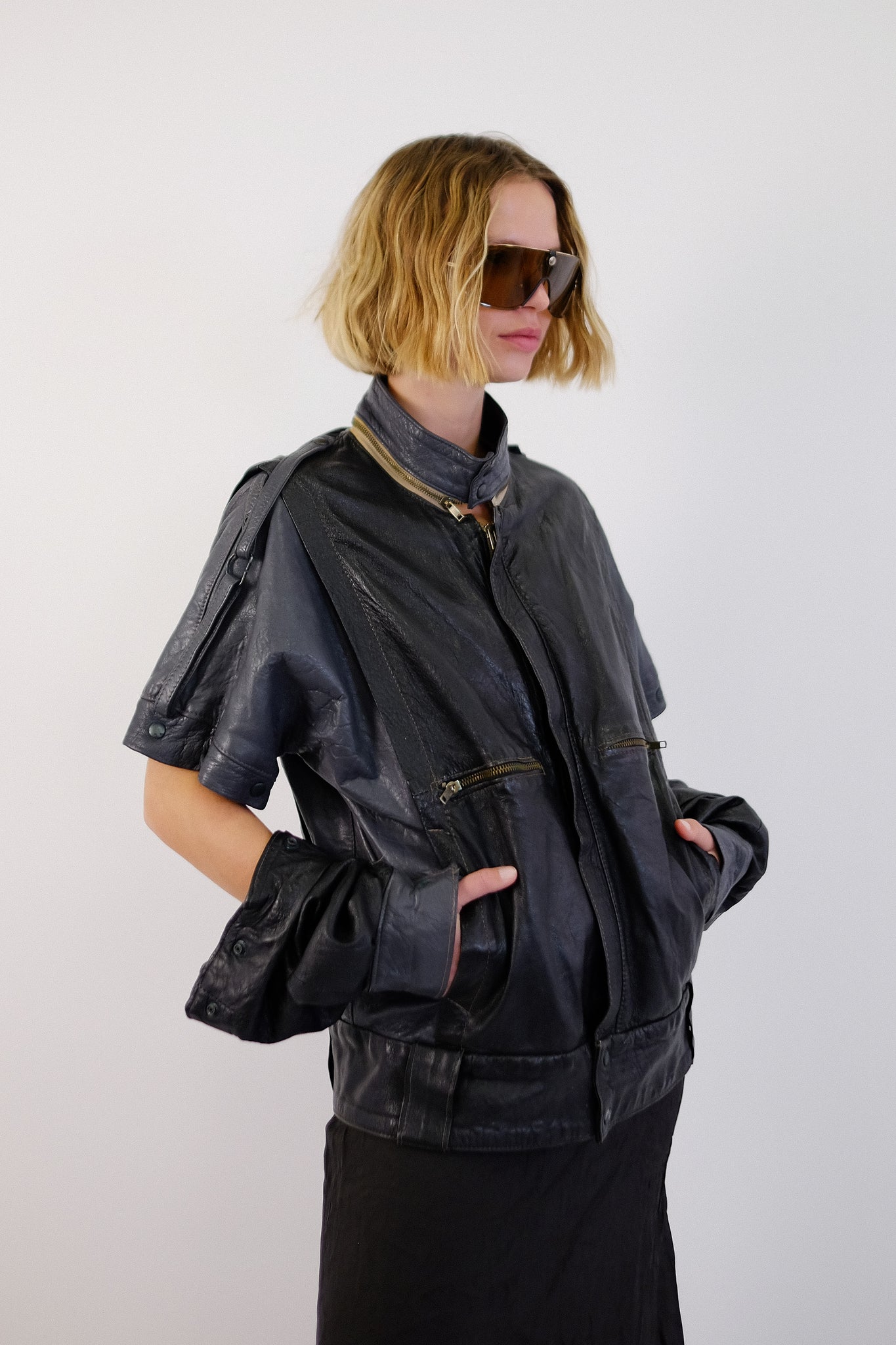 1980S LEATHER CONVERTIBLE SLEEVE STRAP-JACKET