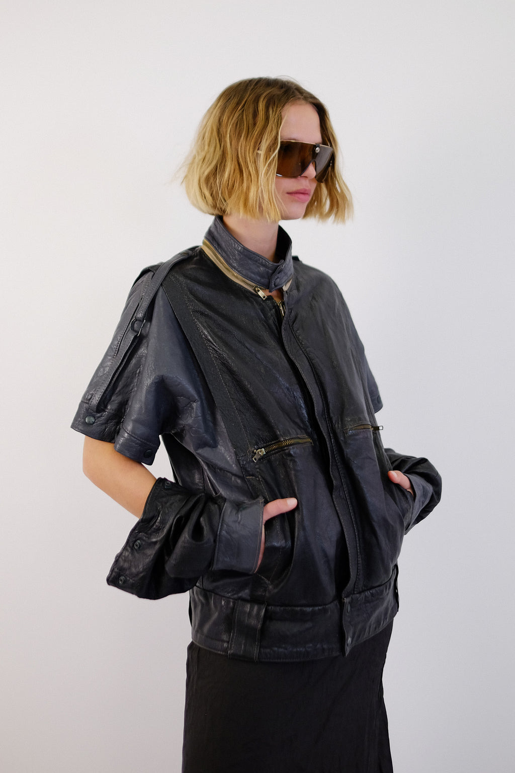 1980S LEATHER CONVERTIBLE SLEEVE STRAP-JACKET