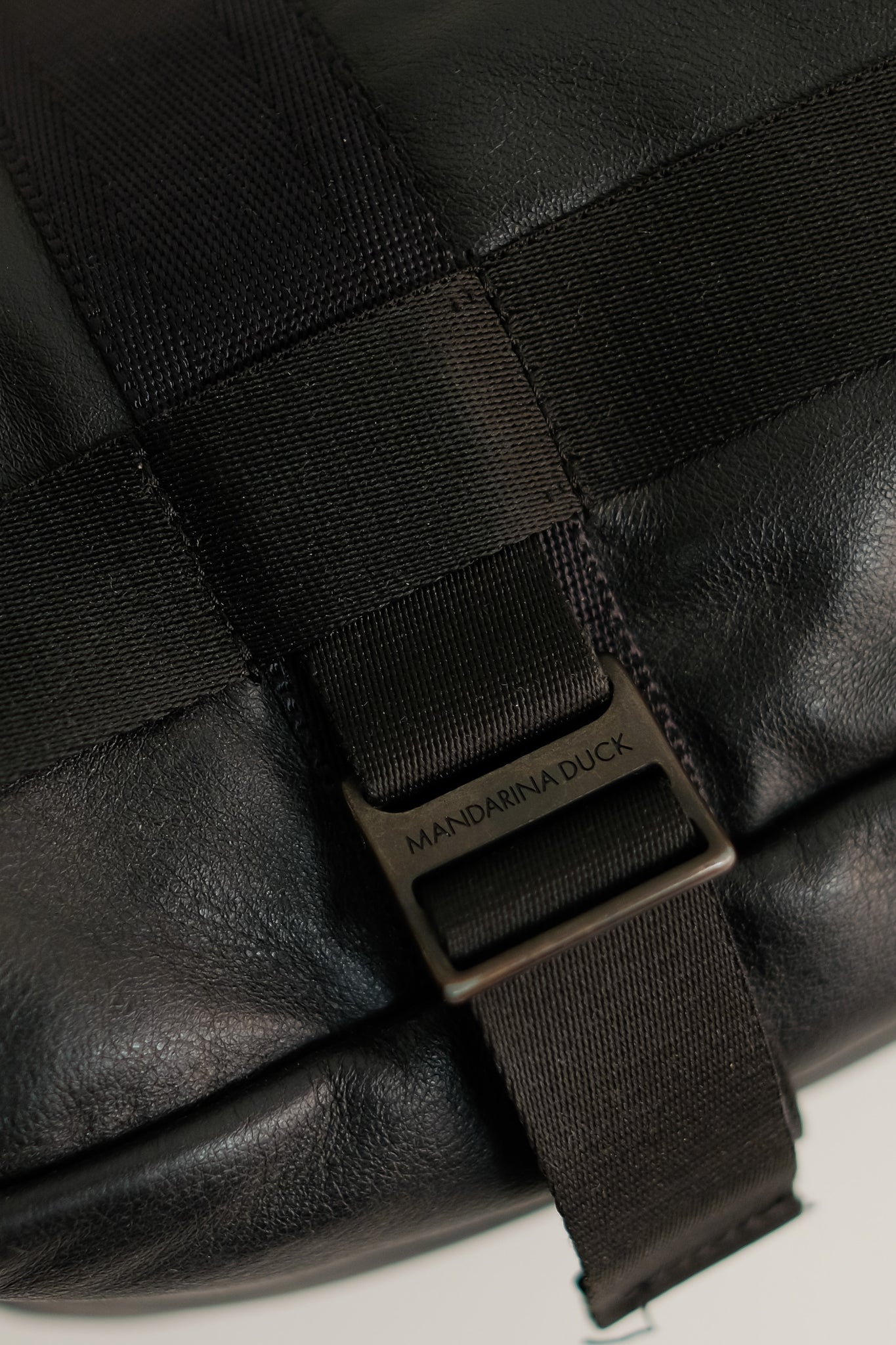 MANDARINA DUCK LEATHER CAGE BAG IN BLACK