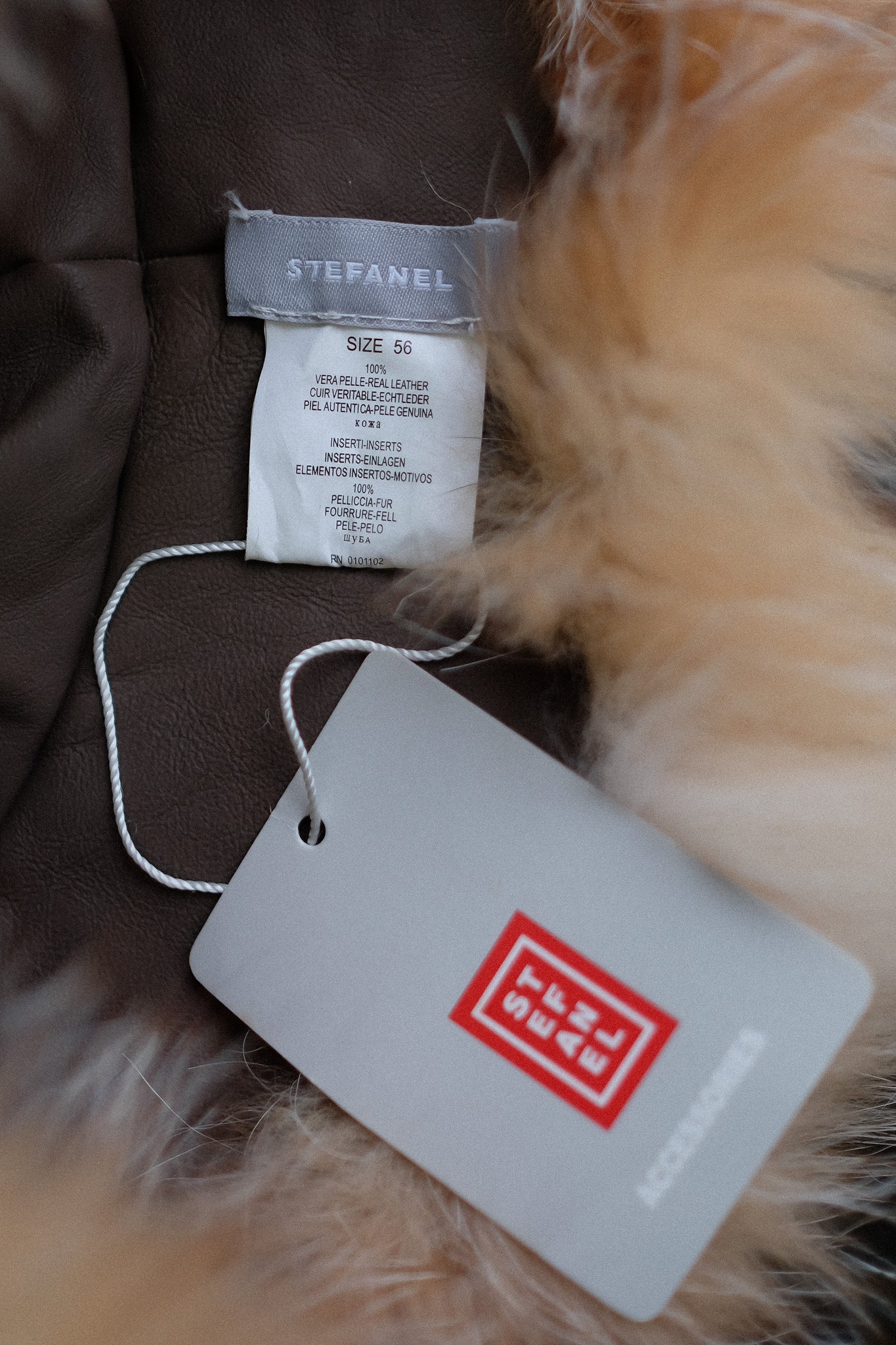 STEFANEL DEADSTOCK SHEARLING FUR HAT IN NEUTRAL