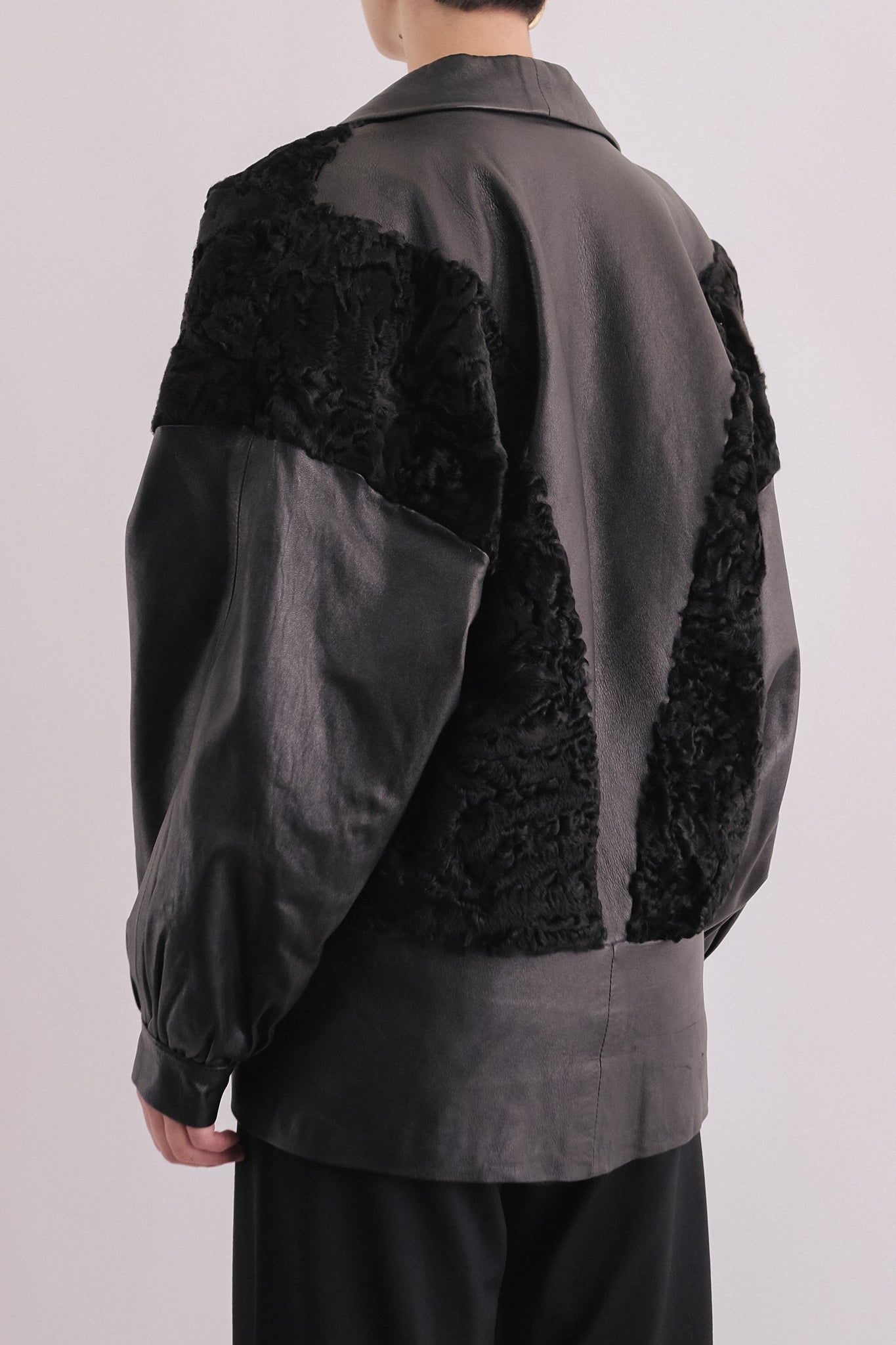 ASTRAKHAN FUR LEATHER JACKET IN BLACK