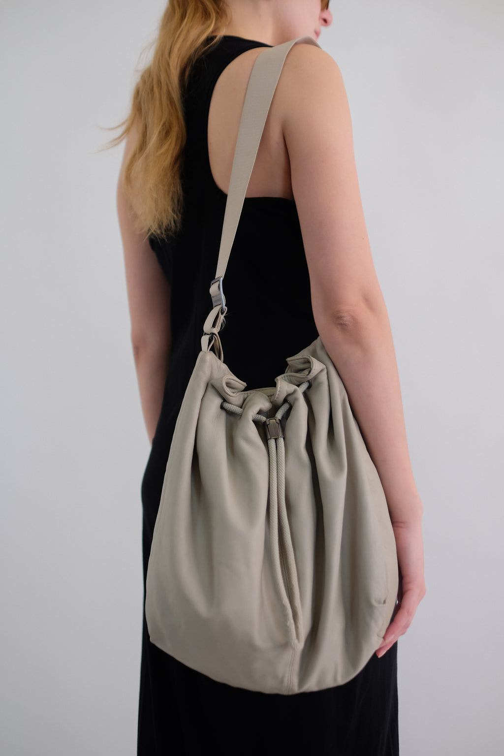 MANDARINA DUCK LEATHER POUCH BAG IN TAUPE WHITE