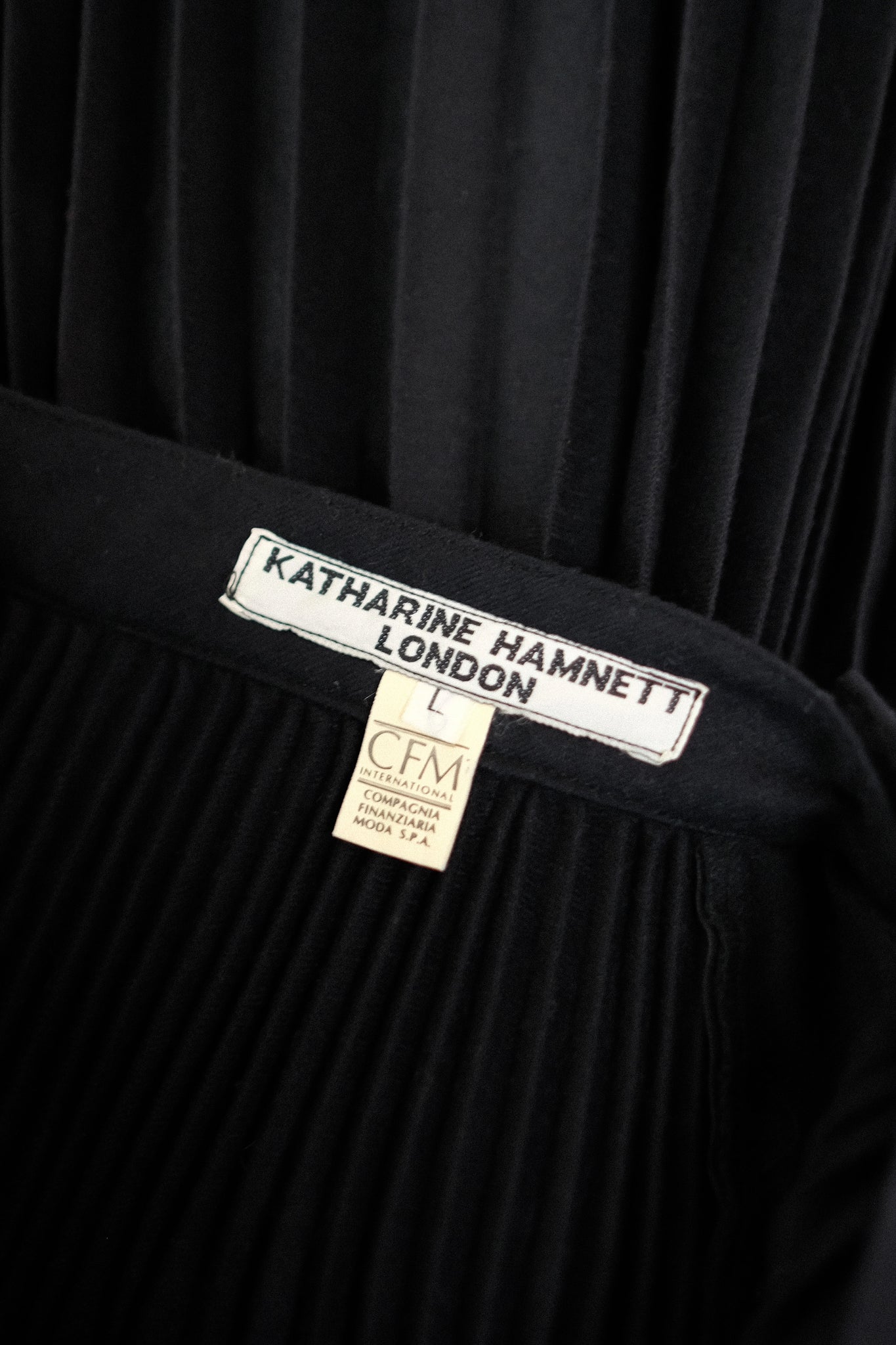 KATHARINE HAMNETT LONDON PLEATED WOOL SKIRT IN BLACK