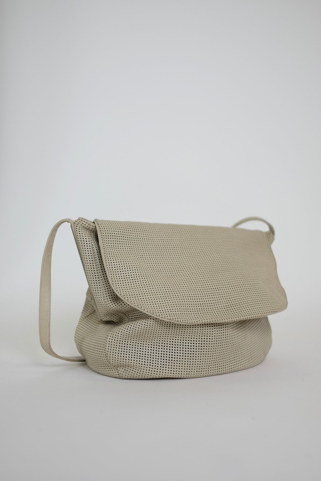 SIMBOLO PERFORATED LEATHER SHOULDER BAG IN OFF WHITE